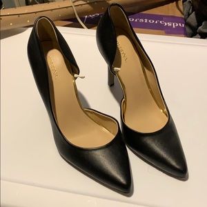 Black leather pointy heels